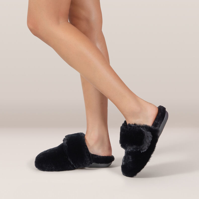 black plush faux fur slipper on foot